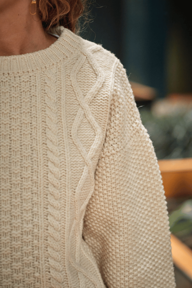 PAOLA Irish Cable Sweater in Merino Wool - Off-White. 100% cruelty- free and sustainable knitwear - L'envers 